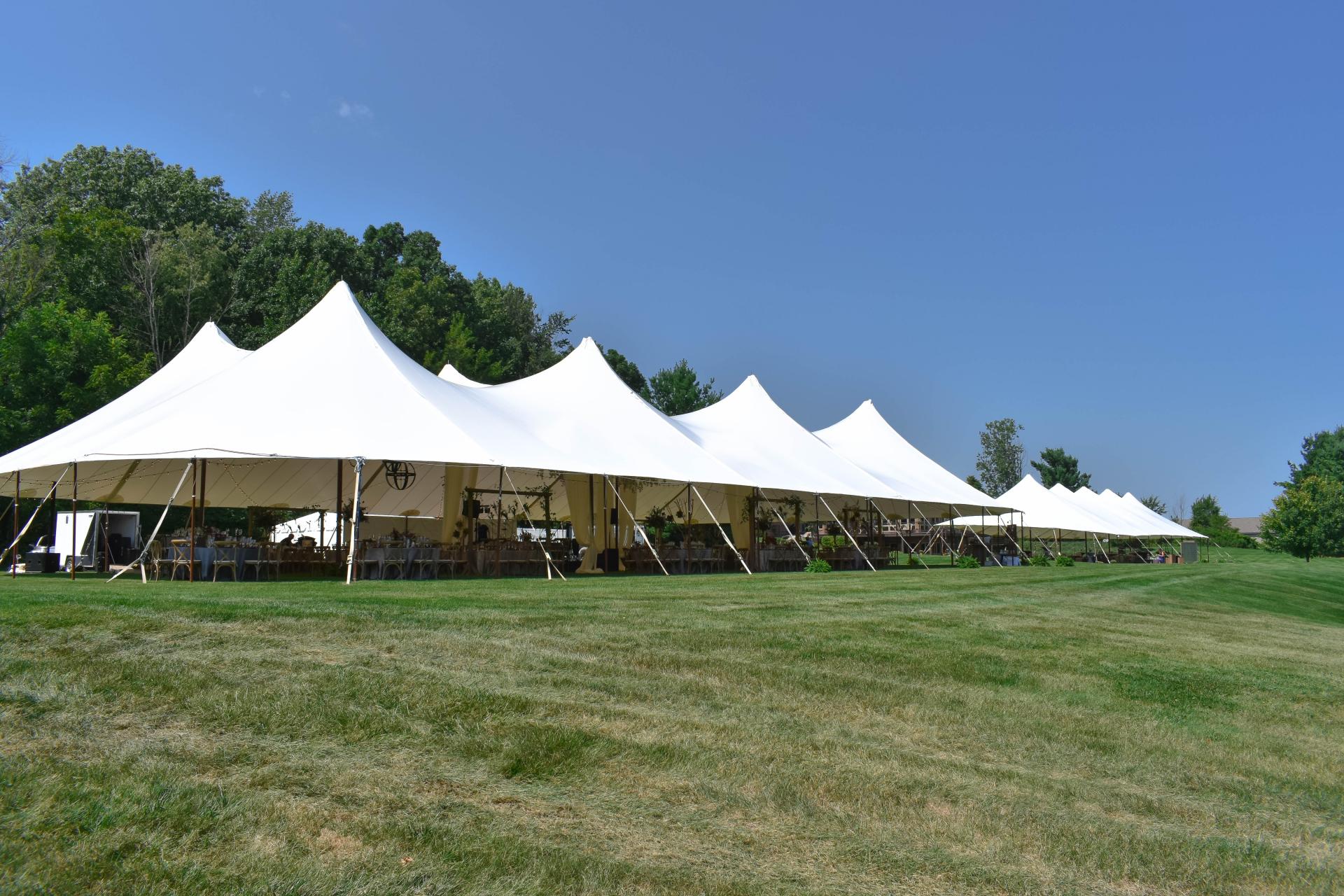 Two Sailcloth Tents Set For A Wedding