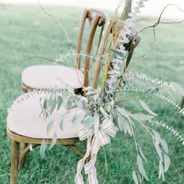Chairs decorated for a wedding